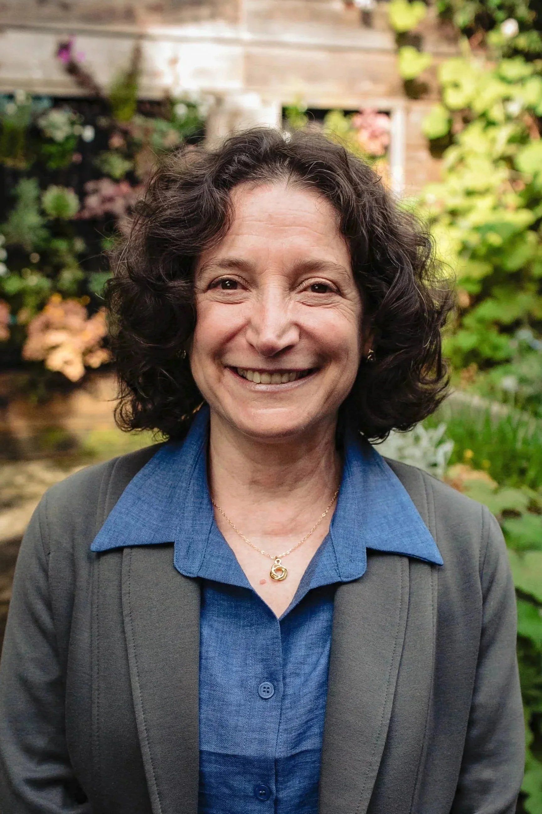 Portrait of Dr. Avril Swan outdoors